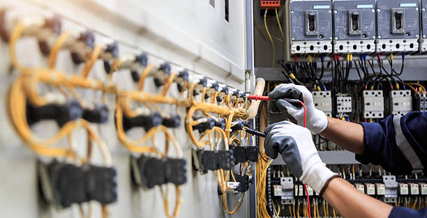 Professional Electrician technician working in Colorado County County, TX